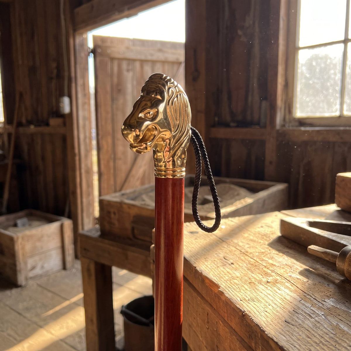 Close-up of the gold lion head handle