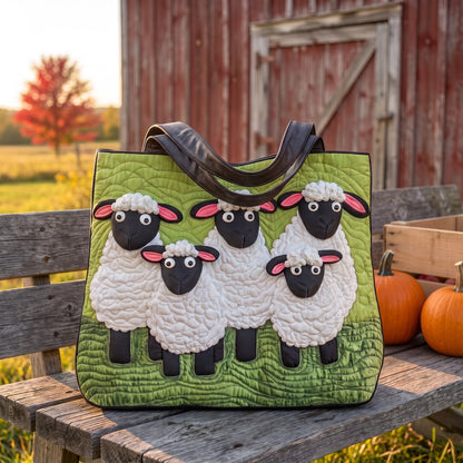 Annapolis Clover quilted sheep tote on a bench by a red barn