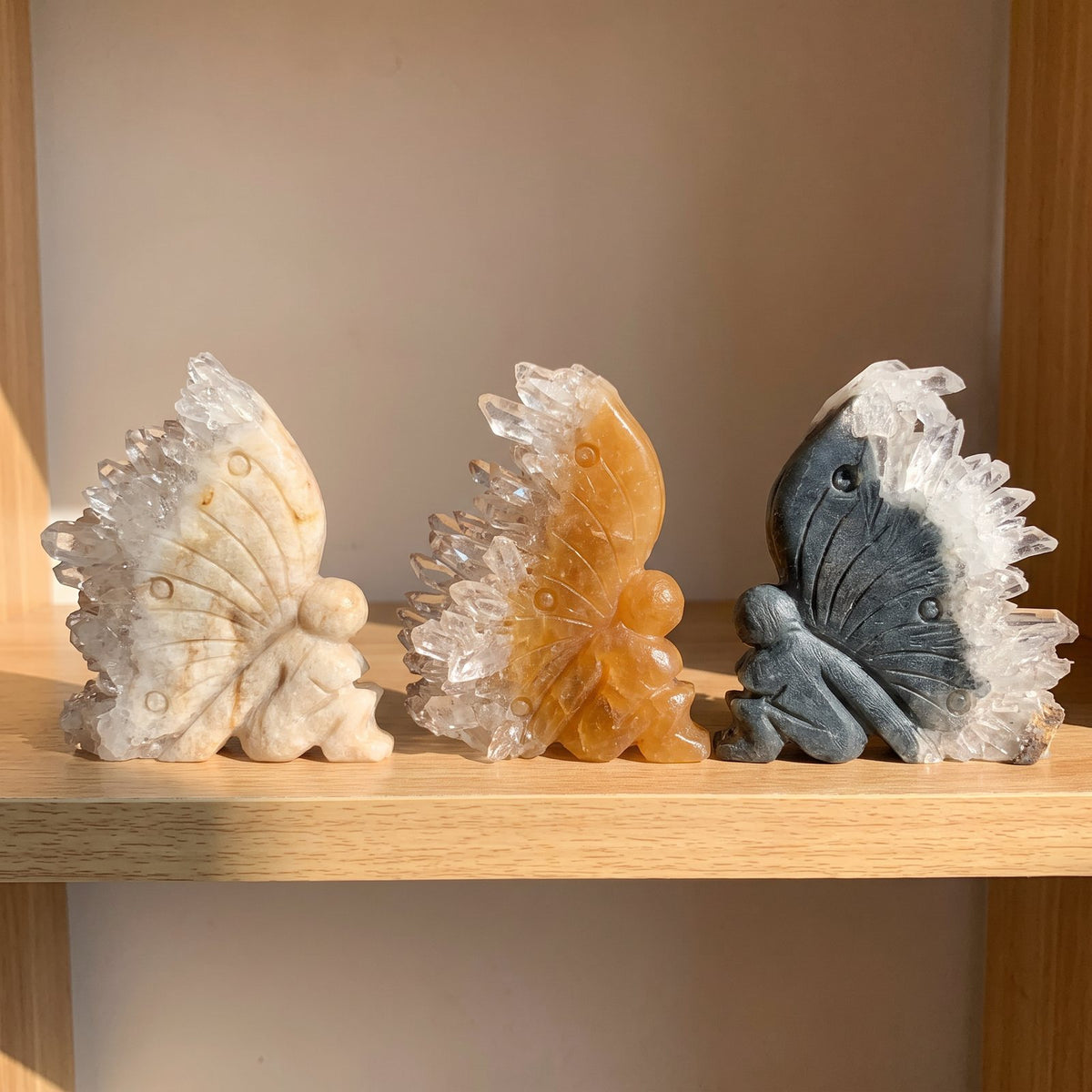 Marlene's hand-carved crystal fairy with a natural quartz wing