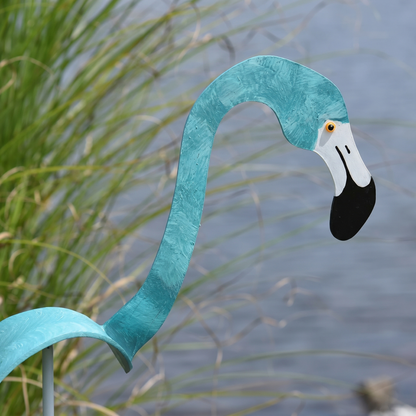 Close-up of the spa blue hand-painted flamingo wind-spinner showing the painted head detail