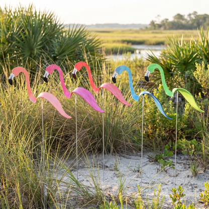 All five hand-painted flamingo wind-spinners in a group — Coral, Hot Pink, Watermelon, Spa Blue, Key Lime