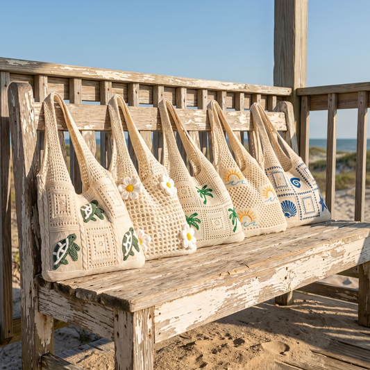 All five Hartwell hand-crocheted beach bags on a porch bench