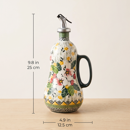 Oil dispenser dimensions: 9.8 in tall, 4.9 in wide including the handle