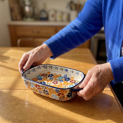 Bernice setting down a Wildflower baking dish