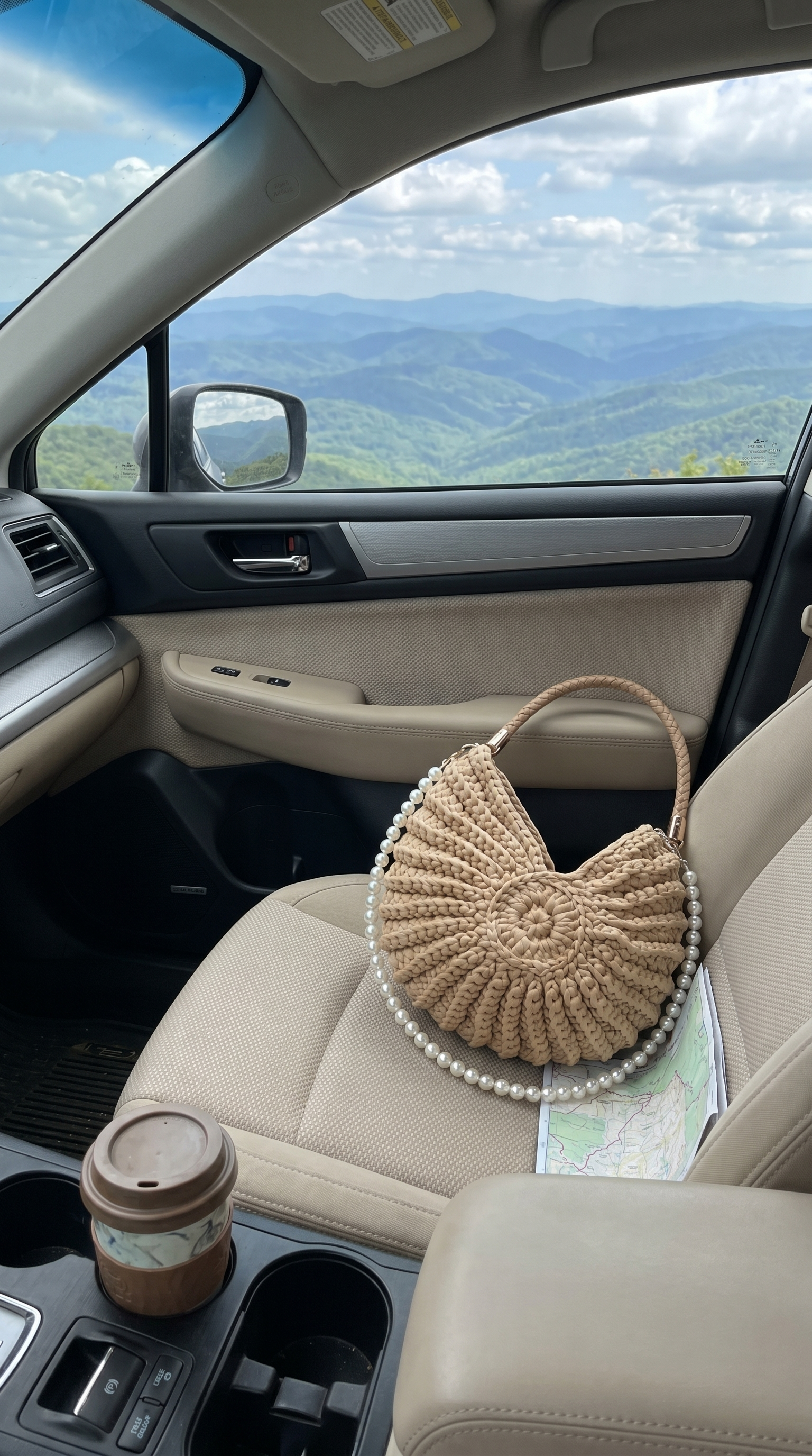 Customer photo of whelk handbag on a coastal road trip