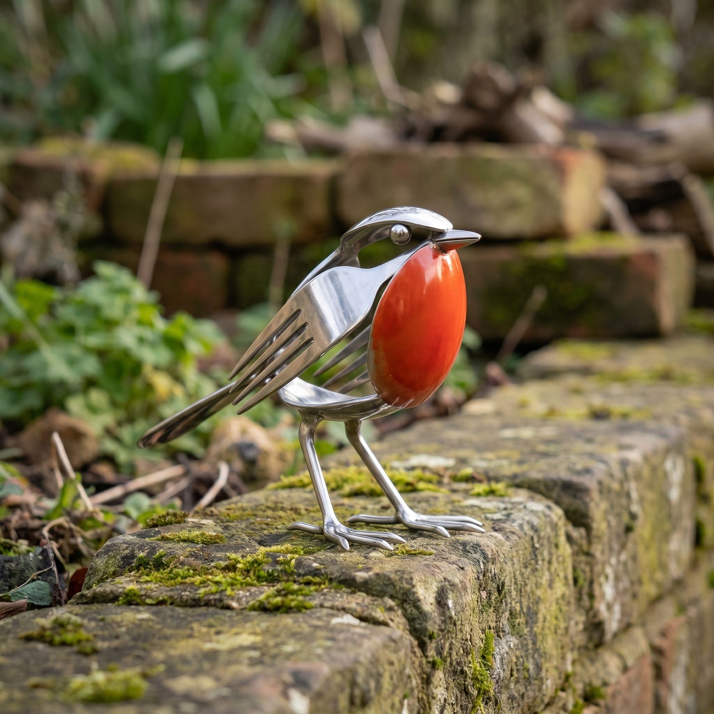Artie's Handmade Metal Robin product image 1: polished silver recycled cutlery robin with red-orange spoon breast