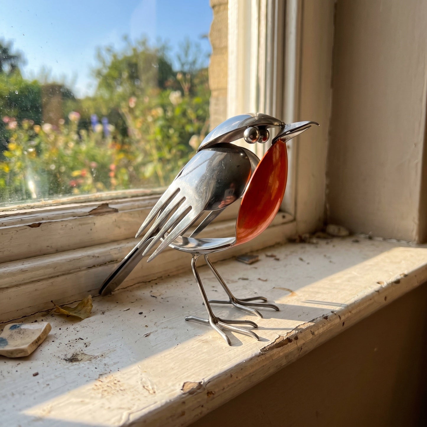 Artie's Handmade Metal Robin product image 3: polished silver recycled cutlery robin with red-orange spoon breast